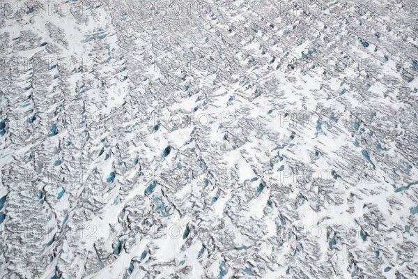 Aerial view of meltwater on the Greenland ice sheet, Arctic landscape, frozen wilderness, glaciers
