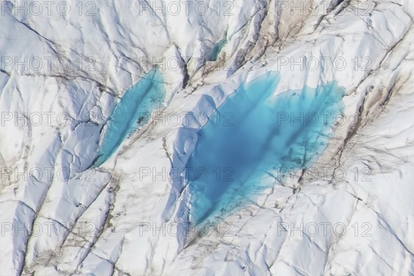 Aerial view of meltwater on the Greenland ice sheet, Arctic landscape, frozen wilderness, glaciers