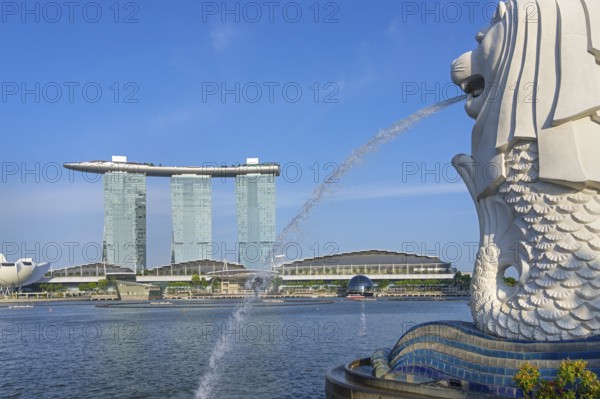 The Merlion fountain and Marina Bay Sands, MBS, luxury 5-star hotel and integrated resort in