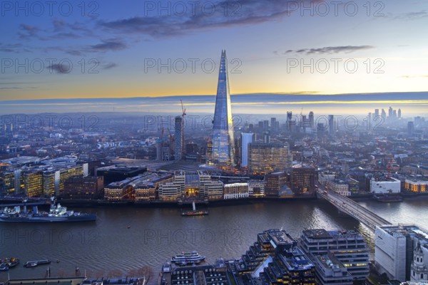 The Shard, pyramid-shaped skyscraper and London Bridge Station along the River Thames in Southwark