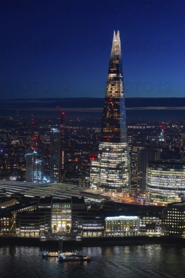 The Shard, pyramid-shaped skyscraper and London Bridge Station along the River Thames in Southwark