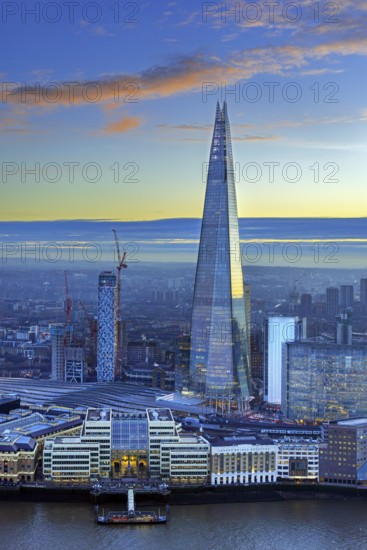 The Shard, pyramid-shaped skyscraper and London Bridge Station along the River Thames in Southwark