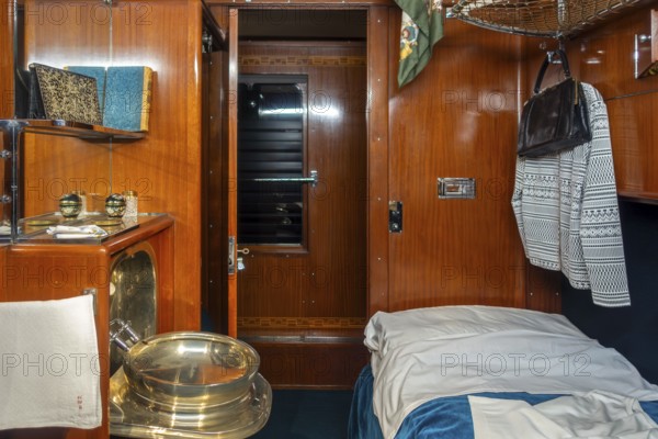 1930s interior of the Royal Belgian sleeper carriage at Train World, railway museum in Schaerbeek,