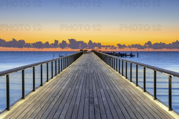 Seebrücke, pier with wooden deck made of azobe, bongossi hardwood at seaside resort Scharbeutz