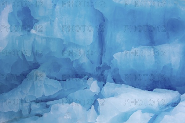 Blue ice wall of Monacobreen, glacier in Haakon VII Land which debouches into Liefdefjorden,
