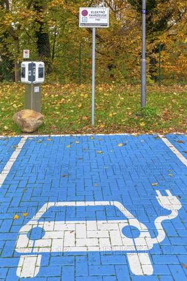 Parking area with empty public charging station / loading point from KEBA, network of chargers for