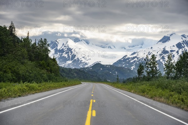 Road through mountain landscape, picturesque landscape with Worthington glacier, dramatic cloudy