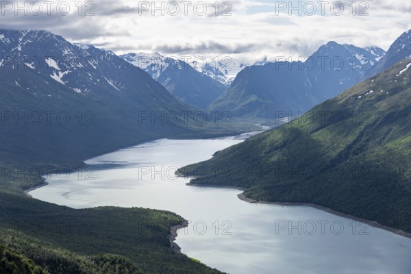 View of blue lake and mountains on Twin Peaks Trail, Eklutna Lake, Chugach Mountains, Chugach State