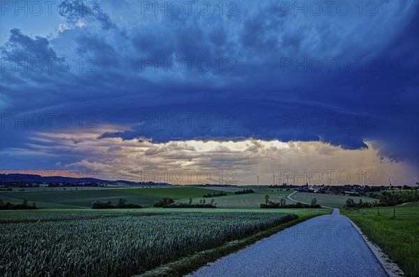Supercell, approaching thunderstorm with impressive and threatening cloud formation, a thunderstorm
