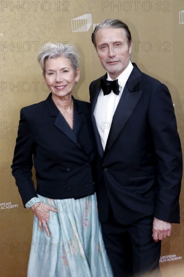 Hanne Jacobsen and Mads Mikkelsen arriving at the European Film Awards at the House of World
