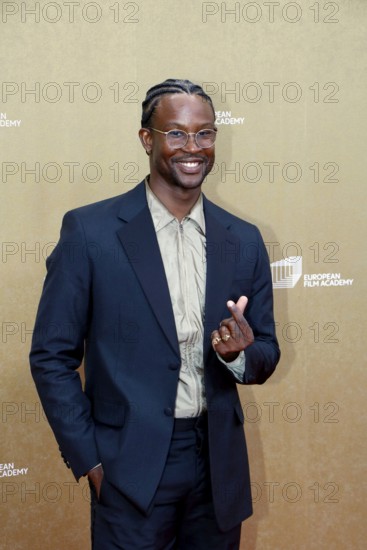 Akinola Davies Jr arriving for the European Film Awards at the House of World Cultures in Berlin on