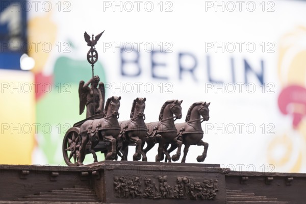 The chocolate quadriga as part of the entire Brandenburg Gate at the Berlin stand at the Green Week