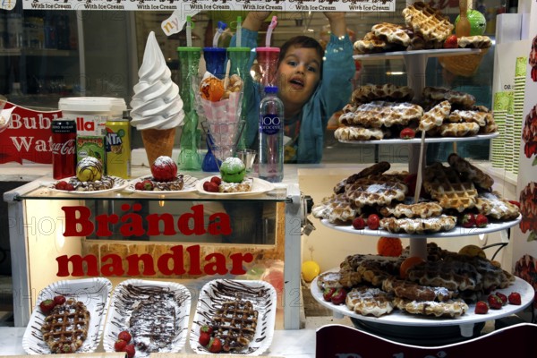 Candy shop in Gamla Stan with pastries and sweet treats in the shop window, Stockholm, Gamla Stan,
