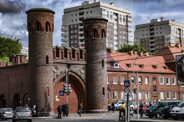 Historic district with Sackheim Gate and modern buildings in the background, Kaliningrad,