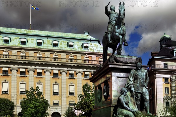 Gustav II Adolf monument on Gustav Adolfs Torg in front of imposing historic buildings, Stockholm,