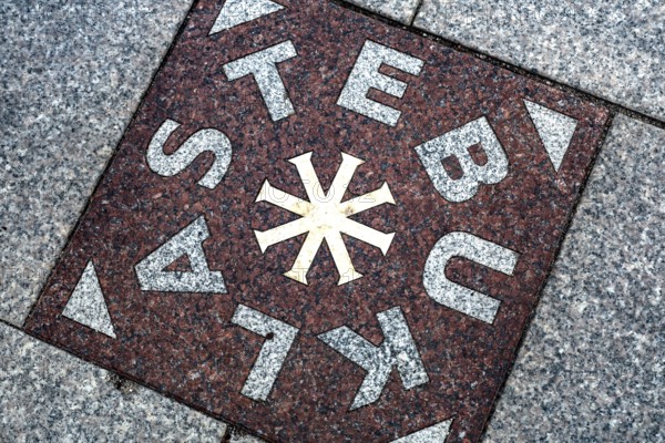 Stebuklas miracle tile in Vilnius Cathedral Square surrounded by paving stones, Vilnius, Vilnius