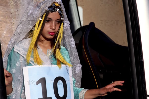 Participant in the Miss Voting at the Fête des Roses in traditional dress, El Kelâa m'Gouna,