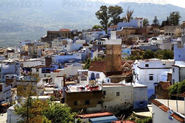 Panoramic view of the iconic blue town of Chefchaouen with surrounding mountains, Chefchaouen,