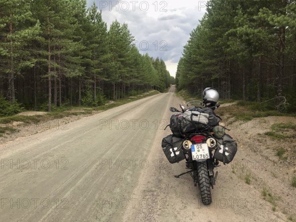 Torsby, Värmlands län, Sweden, BMW G 650 GS Sertao Enduro motorcycle stands on a secluded forest