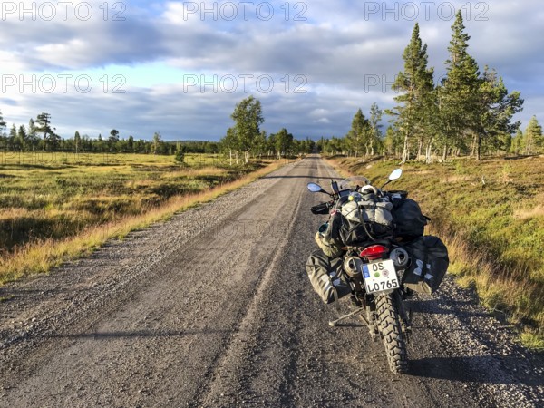Idre, Dalarnas län, Sweden, BMW G 650 GS Sertao enduro motorcycle with full camping equipment on a