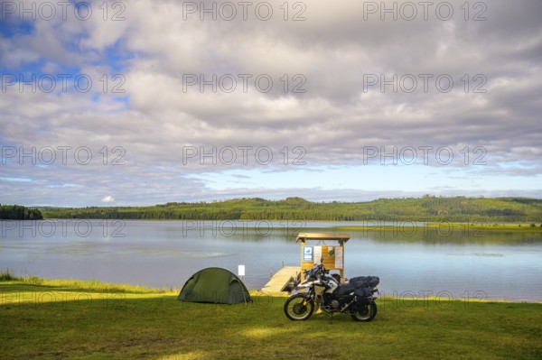Rörström, Dorotea, Västerbotten, Sweden, tent and BMW G 650 GS Sertao Enduro motorcycle on a