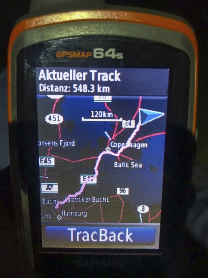 Växjö, Kronobergs län, Sweden, evening view of a GPS device with a mapped route and information