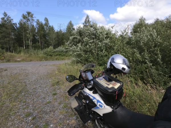 Vikbolandet, Östergötlands län, Sweden, BMW G 650 GS Sertao enduro motorcycle with helmet tank bag