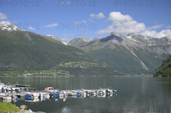 Norddal, Møre og Romsdal province, Norway, harbour with boats against a backdrop of high mountains