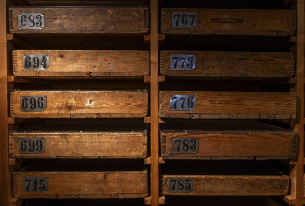 Old wooden cabinet with numbered drawers for storing match labels, Tändsticksmuseet matchstick