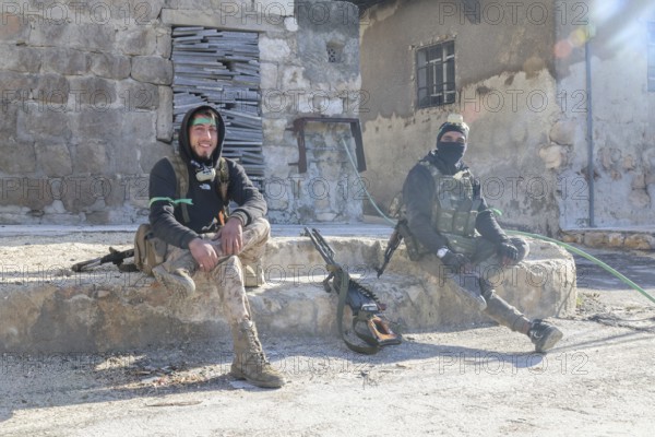 In Aleppo, Syria on January 10, 2026, Syrian Army soldiers deploy throughout the Sheikh Maqsoud and