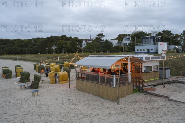 Illuminated beach bar, dusk, Binz, seaside resort, Rügen island, Baltic Sea, Mecklenburg-Western