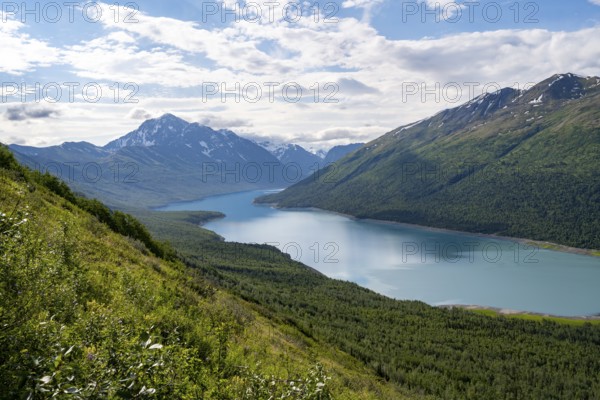 View of blue lake and mountains on Twin Peaks Trail, Eklutna Lake, Chugach Mountains, Chugach State