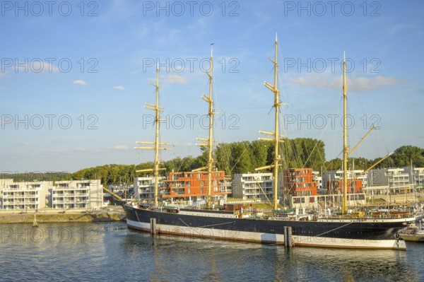 A large sailing ship the legendary 4 Mastbark Passat a flying P-liner, catches the eye in the