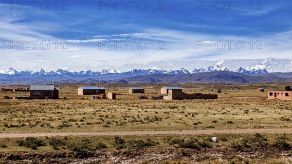 Small houses in the countryside with mountain views and blue skies, The Altiplano landscape in the