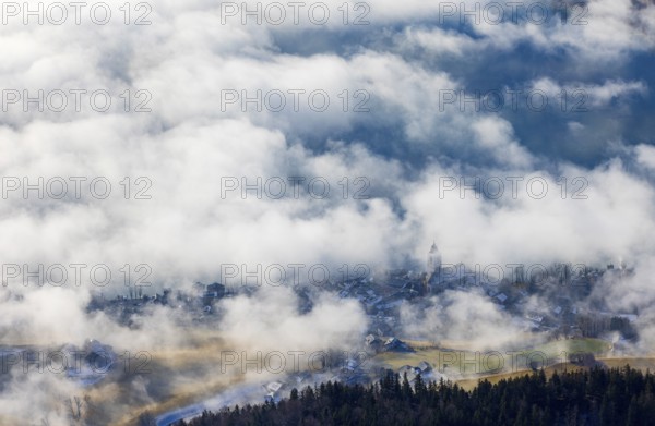 View of a sea of fog from Vormauerstein, Sankt Wolfgang am Wolfgangsee, church tower rising out of
