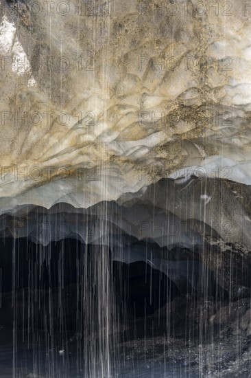 Meltwater at a glacier cave, underground glacier stream, Castner Glacier, Delta Range, Alaska