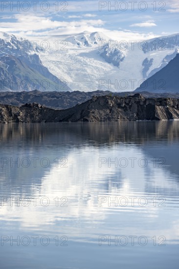 Mountain landscape reflected in glacial lake, Mount Blackburn and Kennicott Glacier, McCarthy Road,