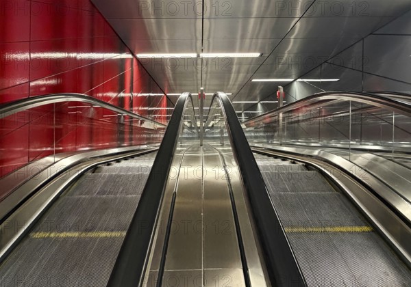 Artwork titled Three Model Spaces by Ralf Brög, escalators at Heinrich-Heine-Allee subway station,