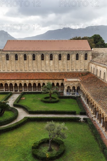 Famous Benedictine monastery cloister, courtyard garden, Norman architecture, Monreale Cathedral,