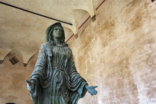 Statue, sculpture of the Virgin Mary at the entrance of Monreale Cathedral, Santa Maria Nuova,