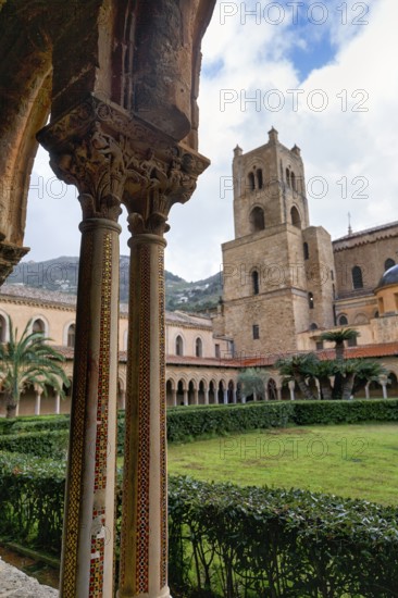 Famous cloister of the Benedictine monastery, decorated double columns, Cathedral of Monreale,