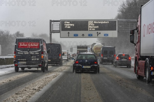 The onset of winter in North Rhine-Westphalia, heavy snowfall, driving on the A3 motorway near