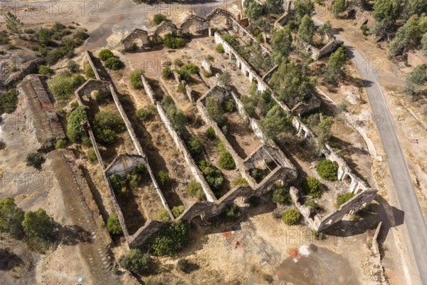 Ruins of former workshop halls, Mina de Sao Domingos, historic copper open-pit mine, aerial view,