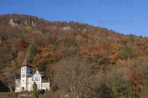 Historic villa in mixed autumn forest in Franconian Switzerland, Muggendorf, Upper Franconia,