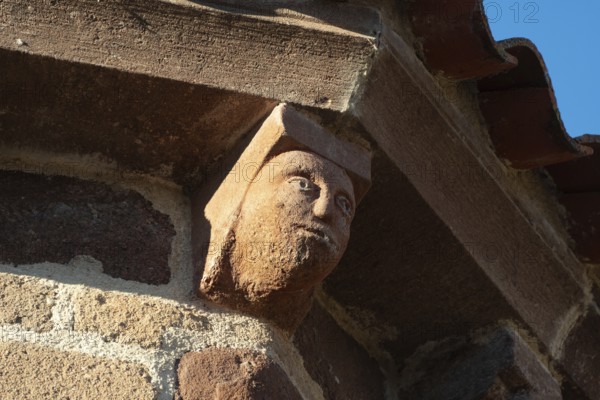 Azerat village. Sculpture of Roman church Saint-Jean-Baptiste . Haute Loire. Auvergne Rhone Alpes.