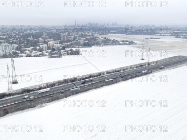 The fields in the north-west of Frankfurt am Main covered in snow. (Aerial view with a drone) On