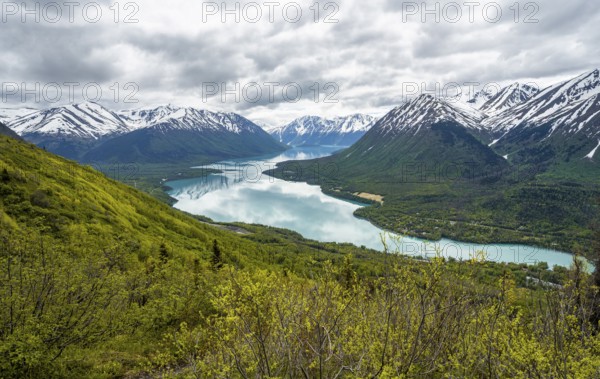 View of snowy mountains and turquoise lake Kenai Lake, Slaughter Ridge Trail, Cooper Landing, Kenai