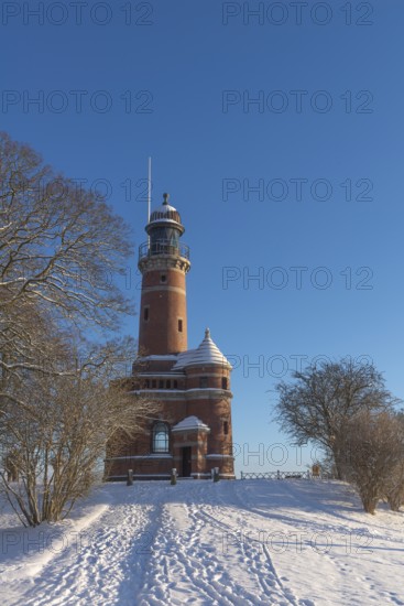 Holtenau lighthouse at the entrance of the Kiel Canal in winter, west bank of the Kiel Fjord,