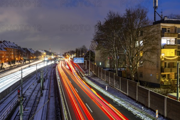 Autobahn A40, Ruhrschnellweg, near Essen at the Frohnhausen junction, evening traffic in winter,