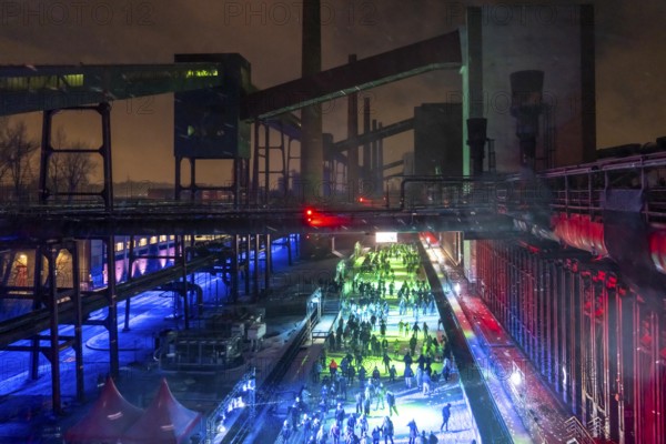 Ice rink at the Zollverein coking plant, ice skating with music and many lighting effects, Essen,